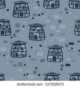 A seamless pattern composed of amusing stone towers, there is a scattering of stones between the towers.