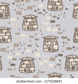 A seamless pattern composed of amusing stone towers, there is a scattering of stones between the towers.