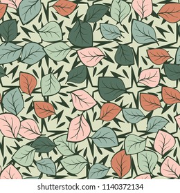 A seamless pattern composed of multi-colored leaves scattered on a texture consisting of four-pointed stars with splashes.