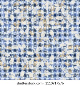 A seamless pattern composed of rounded polygons of different colors. Camouflage style. The picture is covered with a network of small mutually perpendicular ovals.