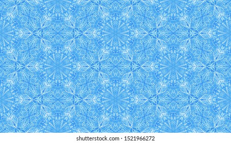 Seamless pattern composed of winter snow pattern. Ice snowflakes in honeycomb. Shades of blue.