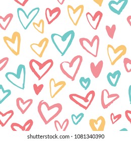 Seamless pattern in the concept of children's drawings. Background with hearts in pastel colors. Great for Baby, Valentine's Day, Mother's Day, wedding, scrapbook, surface textures.
