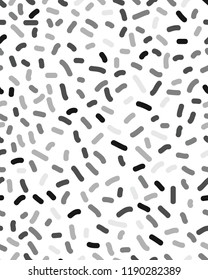 Seamless pattern with confetti on a white background