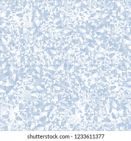 Seamless pattern consisting of broken pentagons. The background is a texture from square suns. In the foreground hatching. Camouflage style.