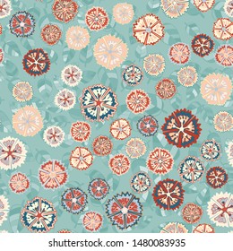 Seamless pattern consisting of carnations of different sizes and leaves.