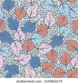 A seamless pattern consisting of chaotically located woody leaves.
The leaves are on a background of square areas filled with spray.