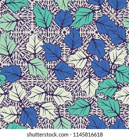 A seamless pattern consisting of chaotically located woody leaves.
The leaves are on a background of square areas filled with spray.