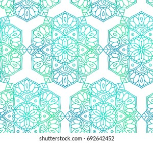 Seamless pattern consisting of colorful mandalas. Eco style. White background. Vector illustration.
