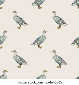 Seamless pattern consisting of a goose made of polygons triangles of different sizes in gray and yellow on a light beige background