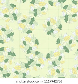 A seamless pattern consisting of groups of multicolored oak leaves. On the background of the picture there is a network consisting of diagonally striped rounded squares.
