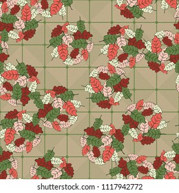 A seamless pattern consisting of groups of multicolored oak leaves. On the background of the picture there is a network consisting of diagonally striped rounded squares.