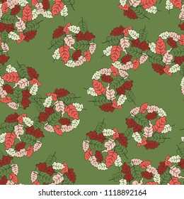 A seamless pattern consisting of groups of multicolored oak leaves.