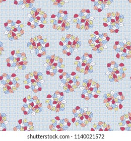 A seamless pattern consisting of heaps of fallen leaves arranged on a texture background consisting of crosses and squares.