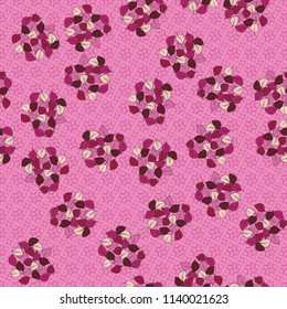 A seamless pattern consisting of heaps of fallen leaves located on a texture background consisting of four-pointed stars and quadrangles.