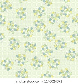 A seamless pattern consisting of heaps of fallen leaves arranged against a texture background consisting of square symbolic flowers.