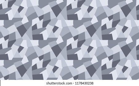 A seamless pattern consisting of hexagons divided into multi-colored areas. Colors of the winter landscape.