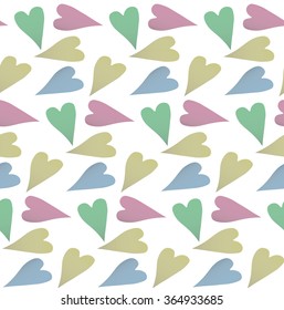Seamless pattern consisting of multiple ornamental hearts of different sizes and colors.