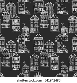 Seamless  pattern consists from hand-drawn facades of houses with architectural elements. Old city.Background in vector.