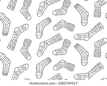 Seamless pattern with contour drawn sock. Doodle knitted warm element of clothing. Different funny line drawn texture socks