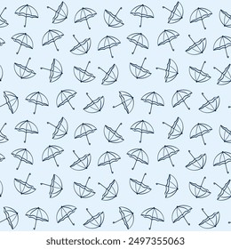Seamless pattern with contour umbrellas in sketch style. Chaotic arrangement. On a light blue background. Textile on fabric