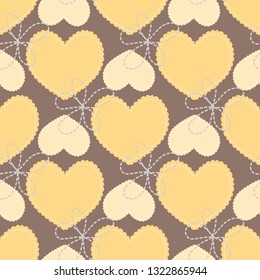 Seamless pattern with cookies on chocolate background.