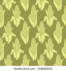 seamless pattern of corn cobs isolated on green background