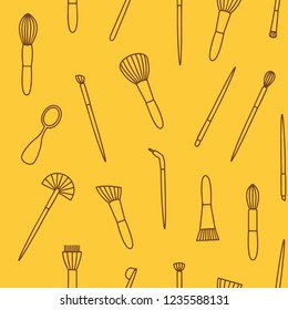 Seamless pattern of cosmetics brushes vector illustration sketch colored yellow brown