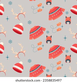 Seamless pattern cosy with winter accessories, jumper, hat, scarf, mugs. 