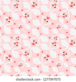 seamless pattern couple swans on pink background