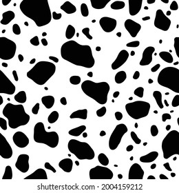 Seamless pattern. Cow or dalmatian. Spots. Black and white.  Animal print, texture. Vector background.