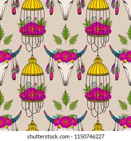 Seamless pattern with cow skull and bird cage. Boho style. Pattern for textile, packaging, greeting cards, invitations, wedding decoration. Bohemian design. Vector illustration.