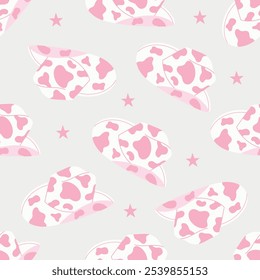 Seamless pattern with cowboy hat, stars. Trendy pink cowgirl hat with cow print. West word, western design. Hand drawn vector illustration