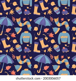 Seamless pattern with cozy autumn clothes for walking in the rain. Autumn design elements, foliage and mushrooms. Printing on fabric or or paper .