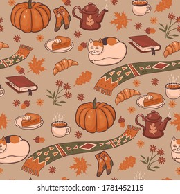 Seamless pattern with cozy autumn graphic elements. Vector graphics.