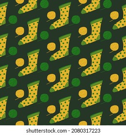 Seamless pattern of cozy knitted socks. Vector background for wrapping paper and different textile design