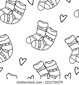 Seamless pattern Cozy knitted socks in doodle style on a transparent background. Vector illustration