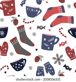 Seamless pattern. A cozy winter ornament with mittens, socks, mugs, cups of tea, Christmas tree branches, snowflakes, New Year's sweets, warm clothes. Vector graphics.