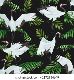 seamless pattern with cranes and palm leaves