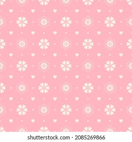 Seamless pattern of cream heart shaped flowers and hearts on a pink background.
