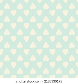 Seamless pattern of cream hearts over light blue background