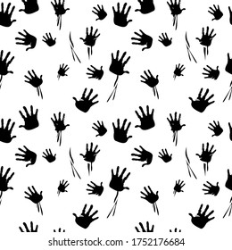 Seamless pattern created by a lot of handprints