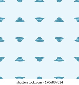 Seamless pattern with creative hand drawn blue panama hats ornament. Pastel light background. Graphic design for wrapping paper and fabric textures. Vector Illustration.