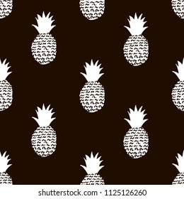 Seamless pattern with creative white pineapples on the black background. Vector illustration