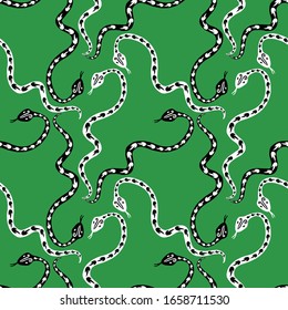 Seamless pattern of creeping black and white snakes