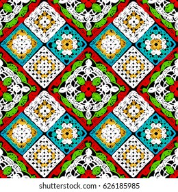 Seamless pattern crochet.  Knitted wear. Folk art motif with flowers. Vector illustration