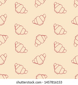 Seamless pattern with croissants. Hand drawn vector illustration