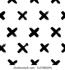Seamless pattern with crosses. Brush strokes pattern. Vector textured hand drawn pattern. Abstract background with brush strokes.