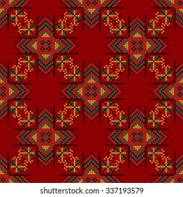 Seamless pattern. The cross-stitch. Yellow, red, green, and black colors. Crafts and Hobbies. A bright background. Symmetrical repetition. Vector illustration.