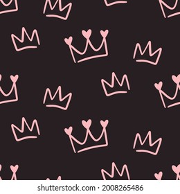 Seamless pattern with crowns. Pink hand drawn doodles on black. Cute baby background, Little princess design for newborn clothes, nursery and kids girls apparel.