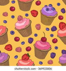 seamless pattern with cupcakes and berries